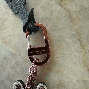 Kaws x Dior Gold and Leather keychain